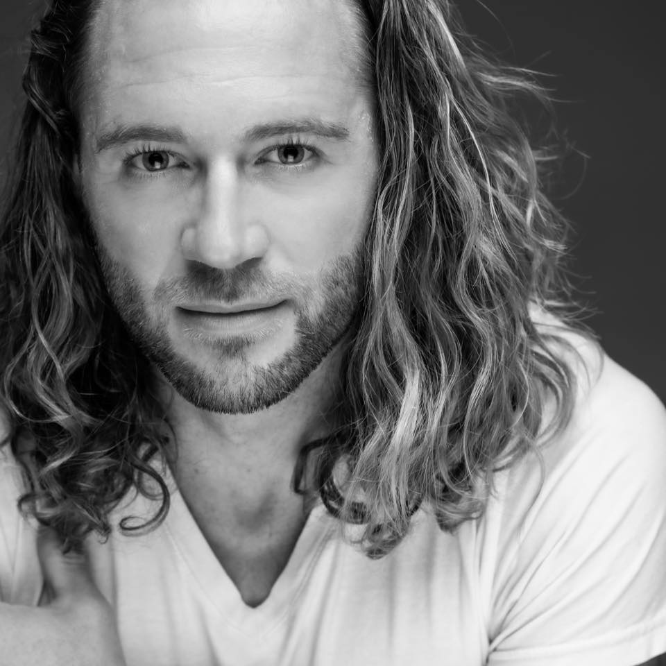 Rusty Hill — Superhost and master craftsman, black and white portrait